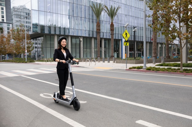 Young adult traveling using sustainable mobility