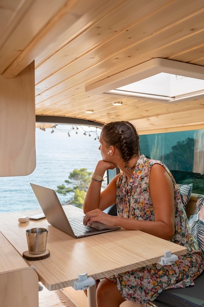 Young adult using digital device while travelling