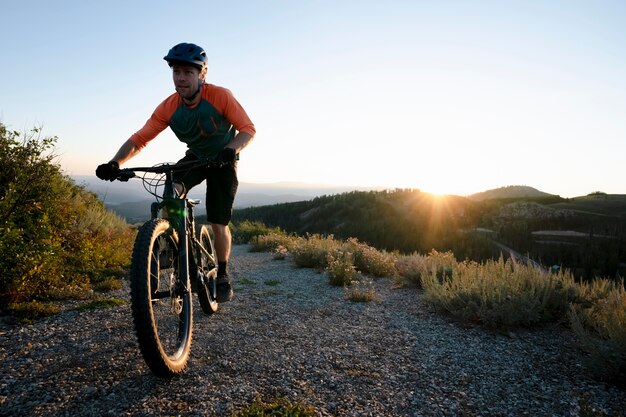 young adult using electric bike in the country side