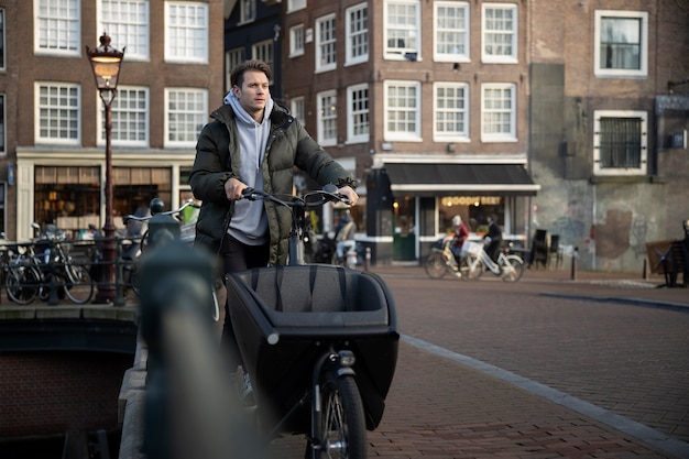 Young adult using sustainable mobility