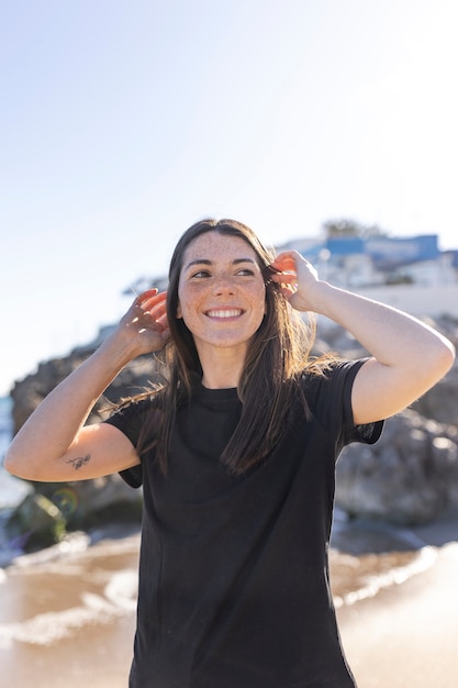 Free photo young adult wearing blank shirt