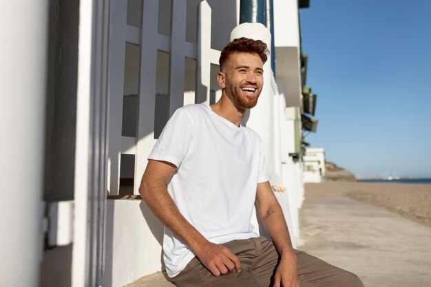 Young adult wearing blank shirt