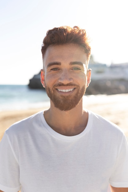 Free photo young adult wearing blank shirt