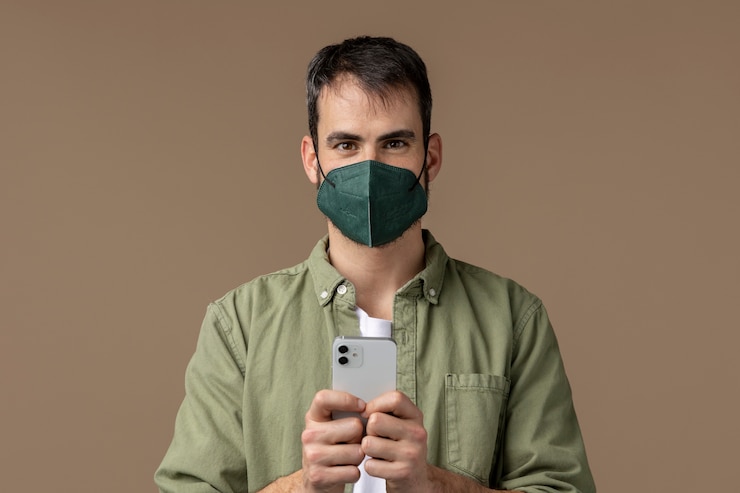 Free Photo young adult wearing face mask