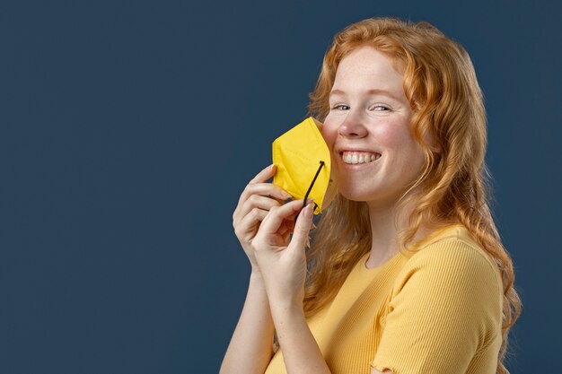 Young adult wearing face mask