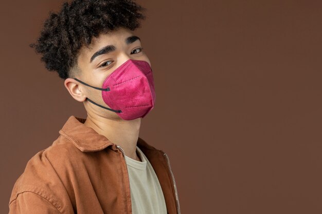 Young adult wearing face mask