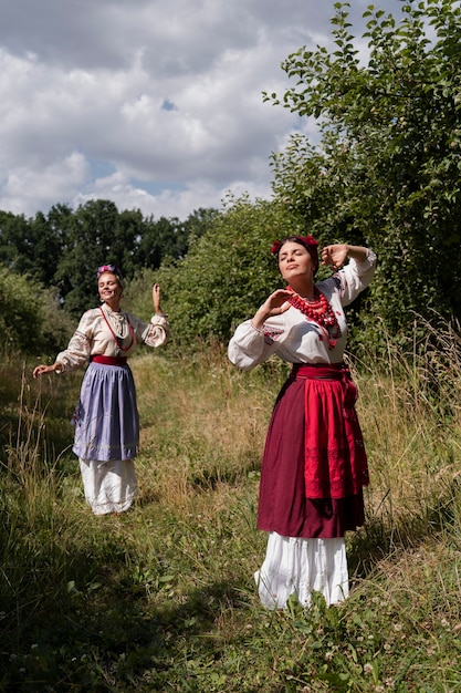 Free photo young adult wearing folk dance costume