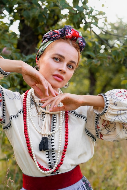 Free photo young adult wearing folk dance costume