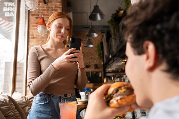 Young adults enjoying food