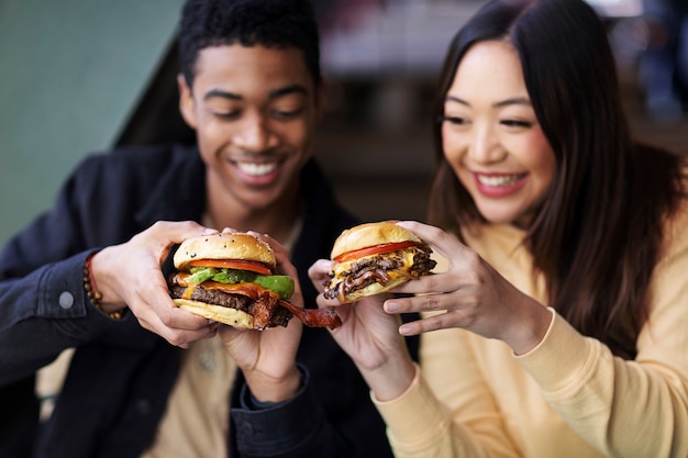 Young adults enjoying food