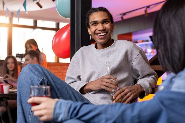 Free photo young adults having a party at home