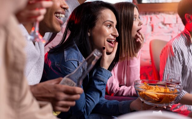 Young adults having a party at home