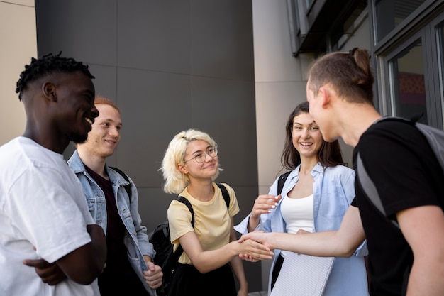 Free photo young adults meeting up to study