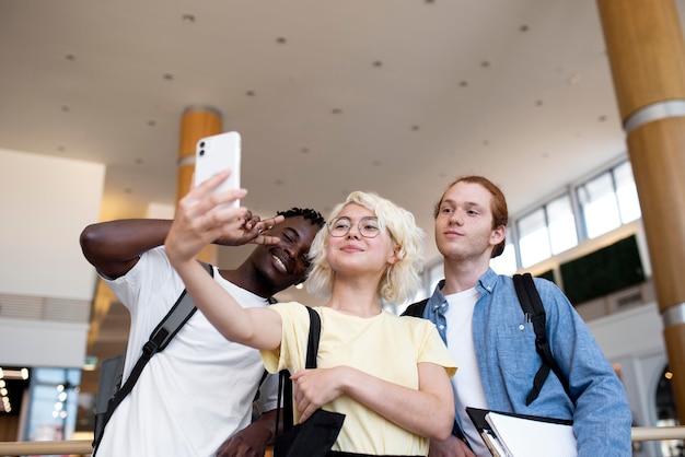 Free photo young adults meeting up to study