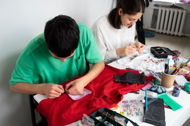 Young adults reusing fabric material