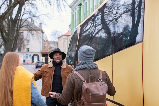 Young adults travelling in winter time