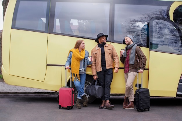 Young adults travelling in winter time