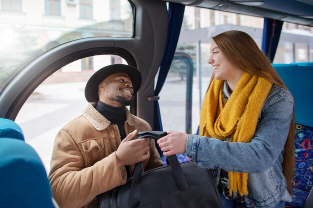 Young adults travelling in winter time