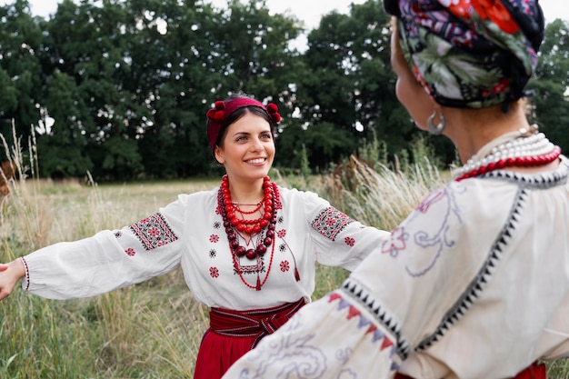 Young adults wearing folk dance costume