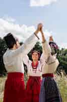 Free photo young adults wearing folk dance costume