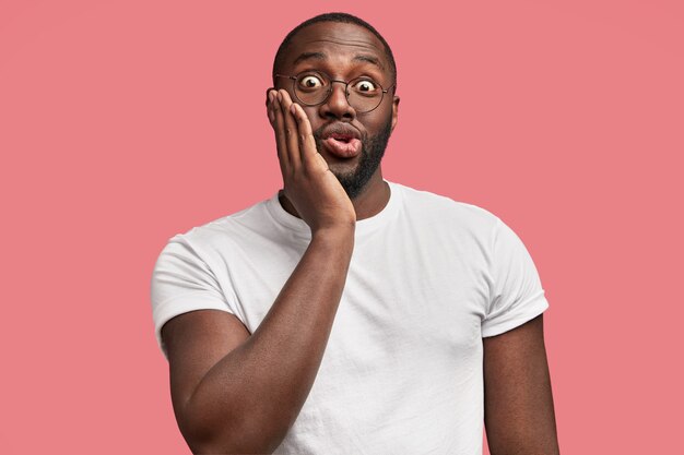 Young African-American man in casual T-shirt