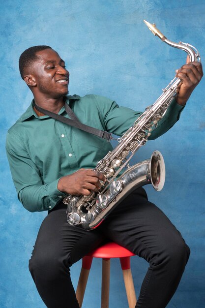 Young african american man celebrating international jazz day