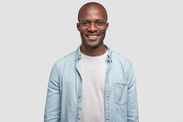 Free photo young african american man wearing denim shirt