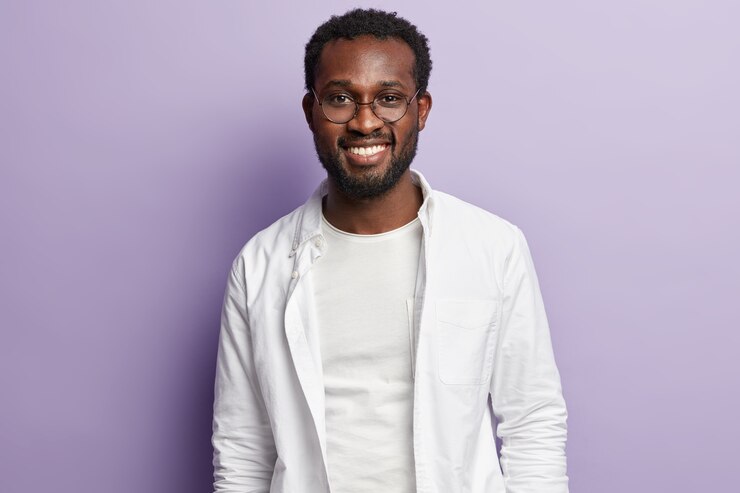 Free Photo young african american man wearing white shirt