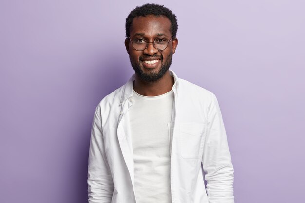 Young African American man wearing white shirt