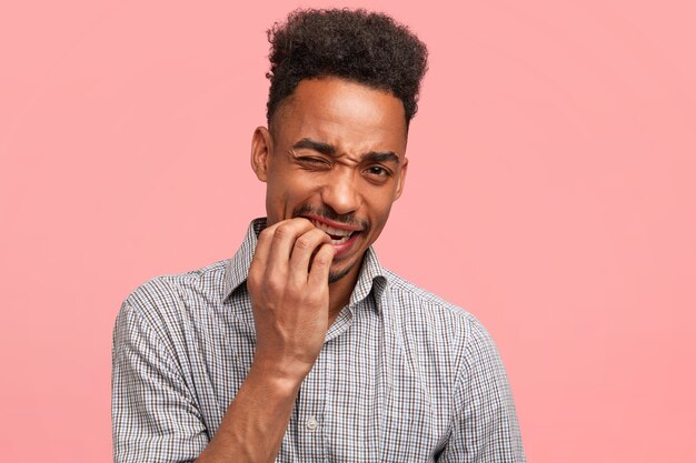 Young African-American man with striped shirt