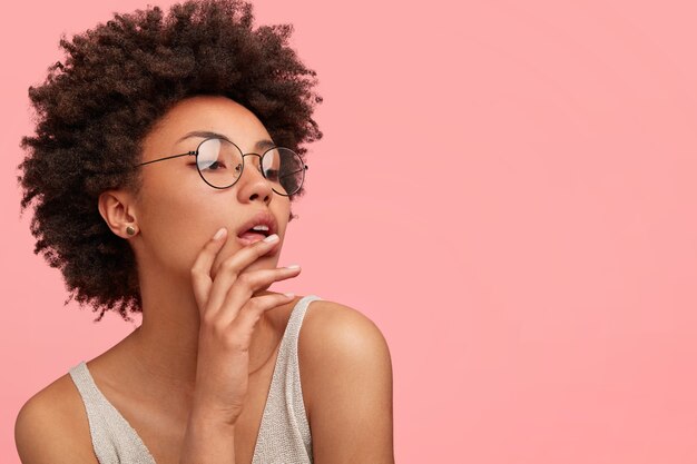 Young African-American woman wearing round eyeglasses