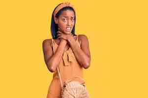 Free photo young african american woman wearing summer outfit shouting and suffocate because painful strangle. health problem. asphyxiate and suicide concept.