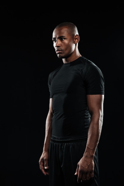 Young afro american sports man, looking away