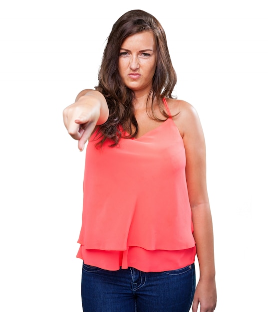 young angry woman pointing to front