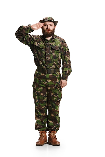 Young army soldier wearing camouflage uniform isolated on white