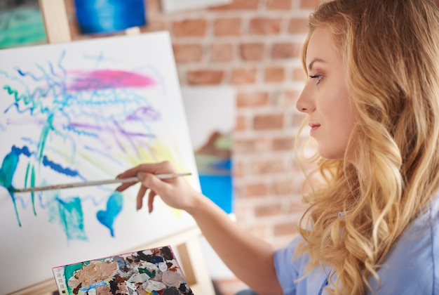 Young artist at her workshop