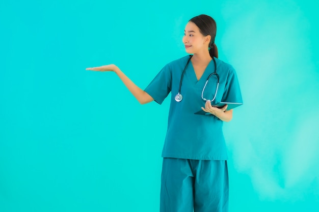 young asian doctor woman holding smart tablet device