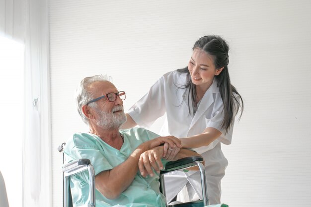 Asian senior patient having consultation with doctor | Premium Photo