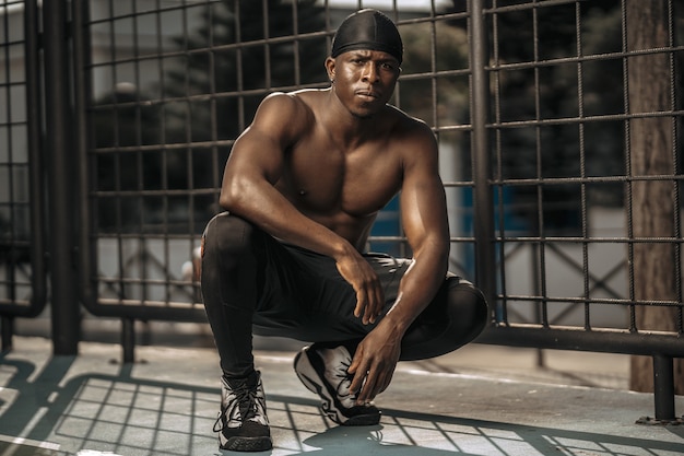 Young athlete male posing summer tracksuit healthy style