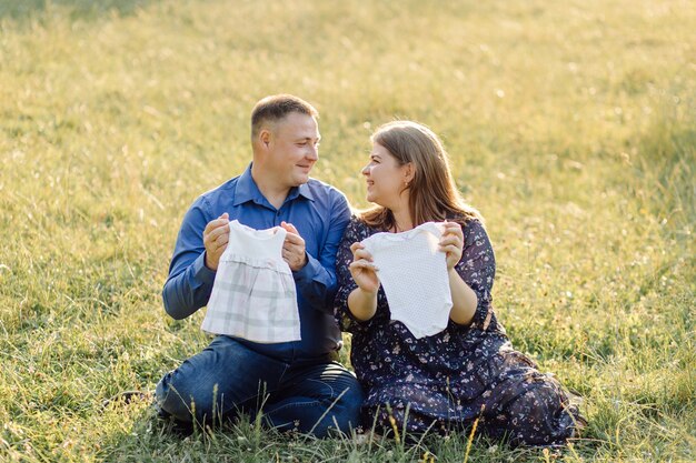 Young attractive couple pregnant mother and happy father