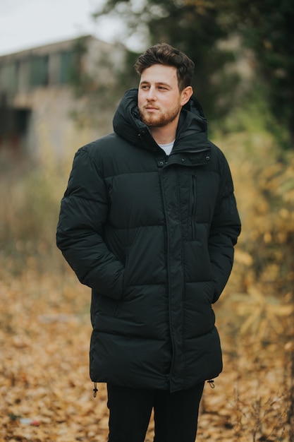 young and attractive male posing in nature