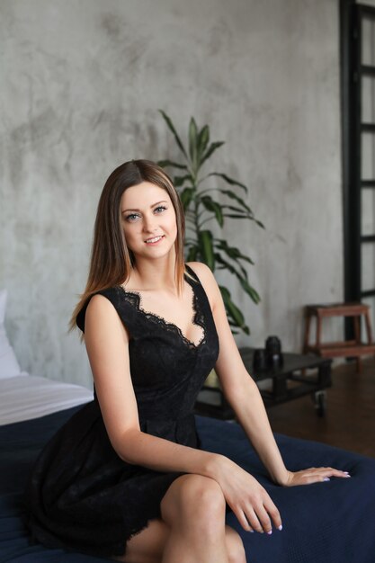 Young attractive woman posing in sofa