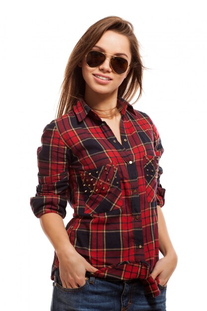 Young attractive woman in shirt and sunglasses