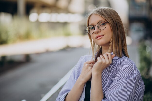 Young attractive woman walking in the street