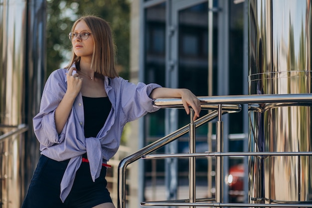 Young attractive woman walking in the street