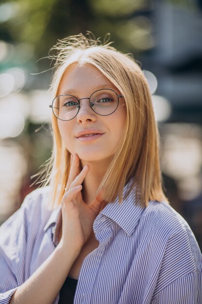 Young attractive woman walking in the street