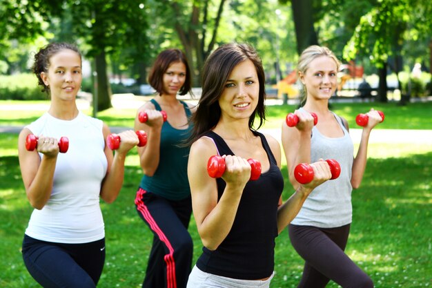 Young and attractive womans doing fitness exercises