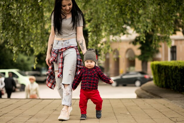 young baby walking walk family