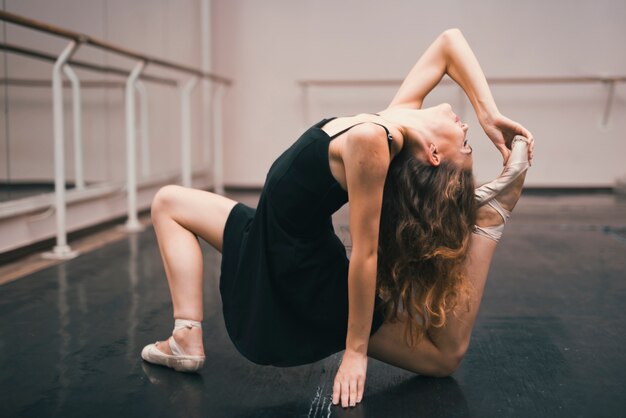Young ballerina practising in the dance studio