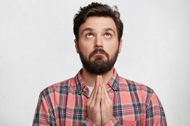 Young bearded man with striped shirt